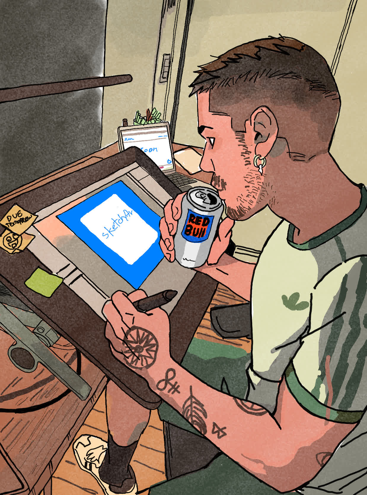Tattooed man with a buzz cut drinking from a Red Bull can while holding a pen over a graphics tablet.