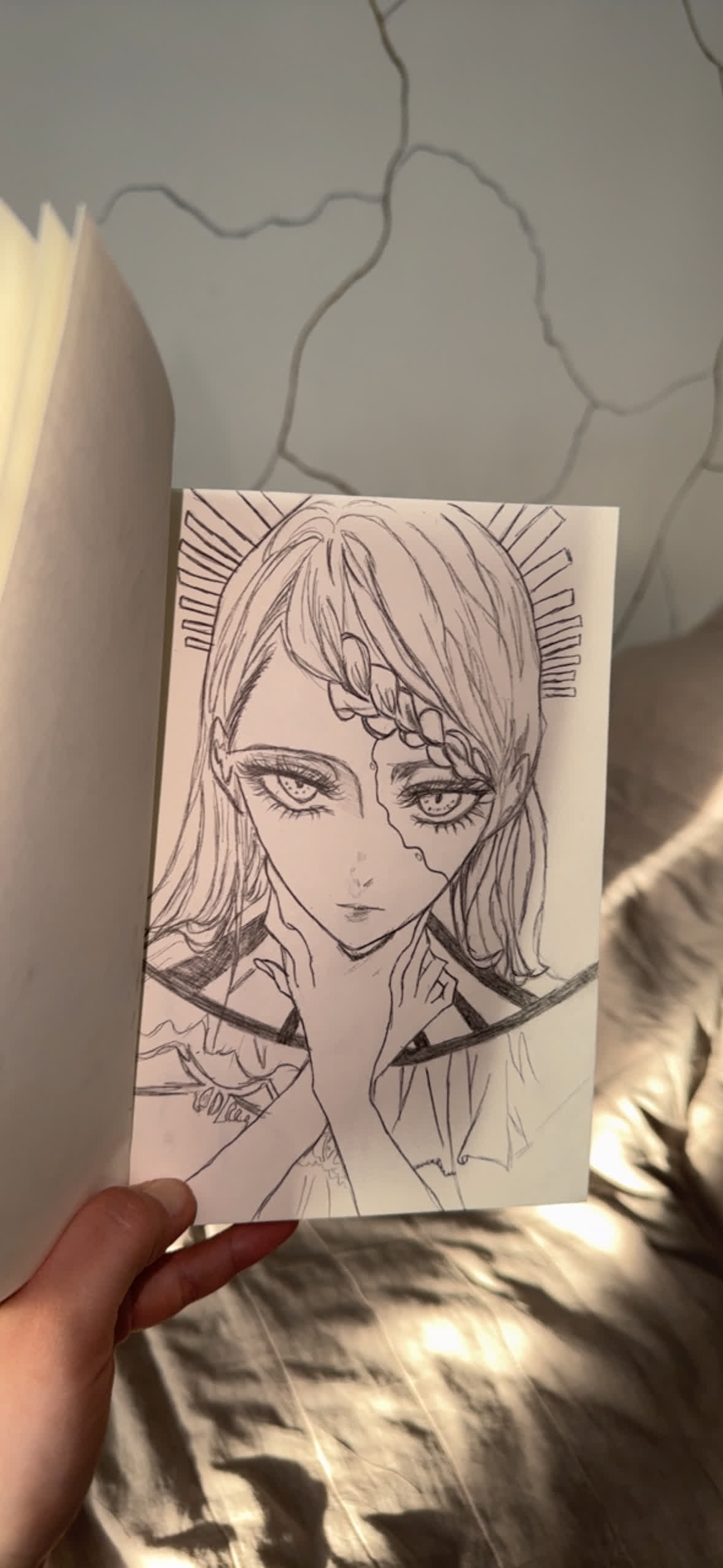 Anime girl with a braid over one side of her head, two hands on her cheeks, and short rays behind her head.