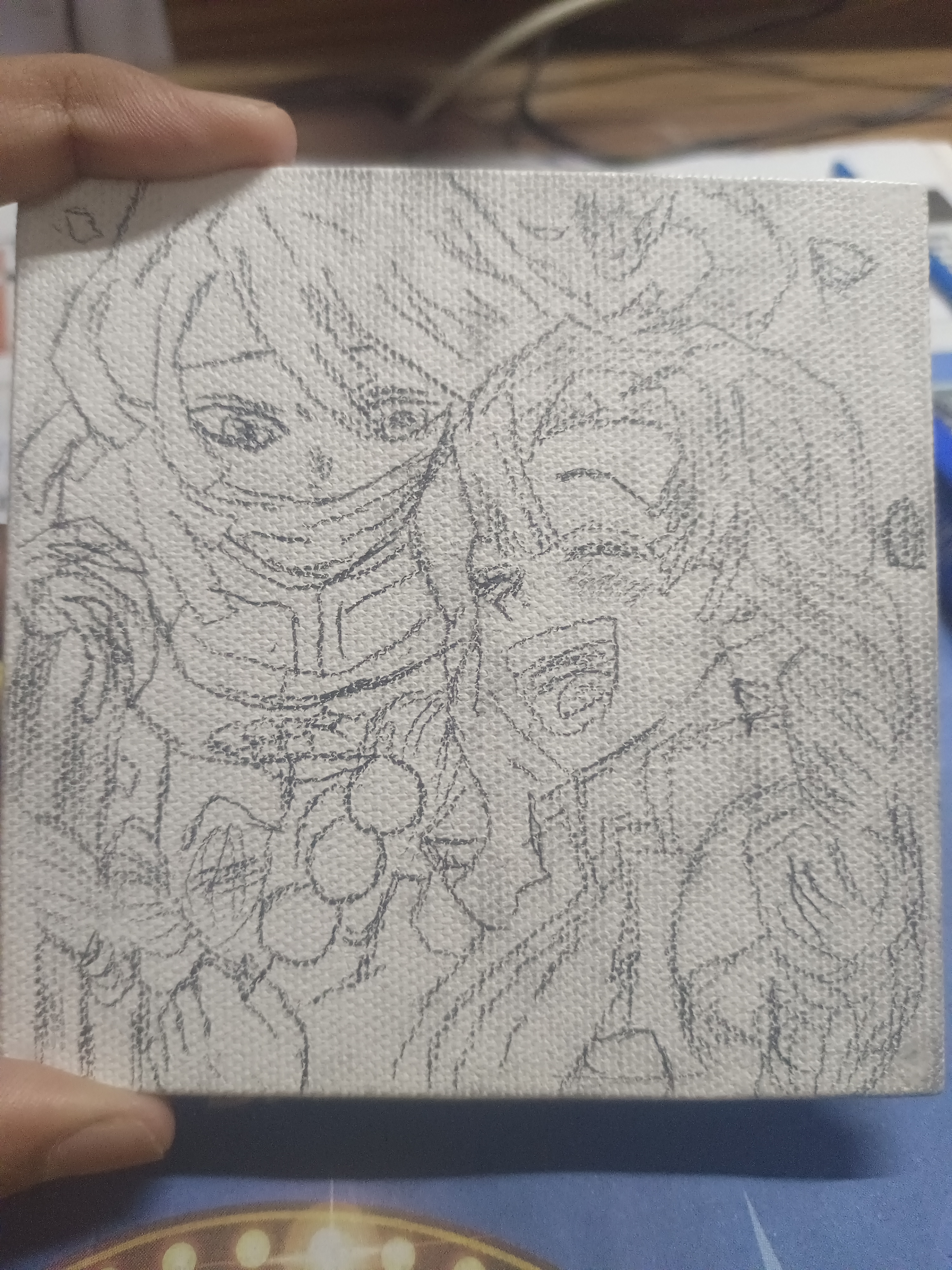 Two anime characters sketched in pencil on canvas, one with a mask and open eyes, the other with closed eyes.