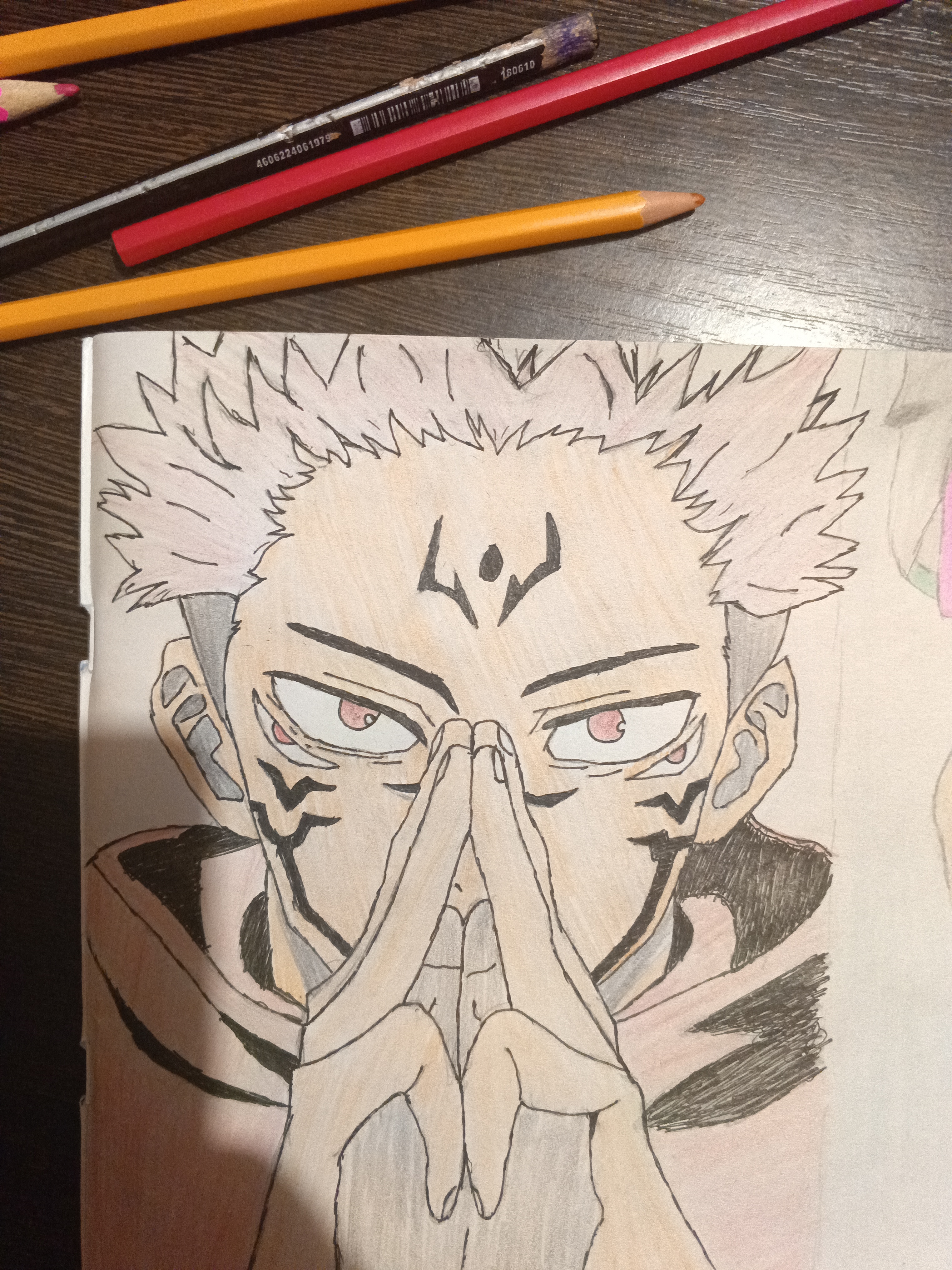 Ryomen Sukuna from Jujutsu Kaisen with pink spiky hair and hands pressed together before his face.